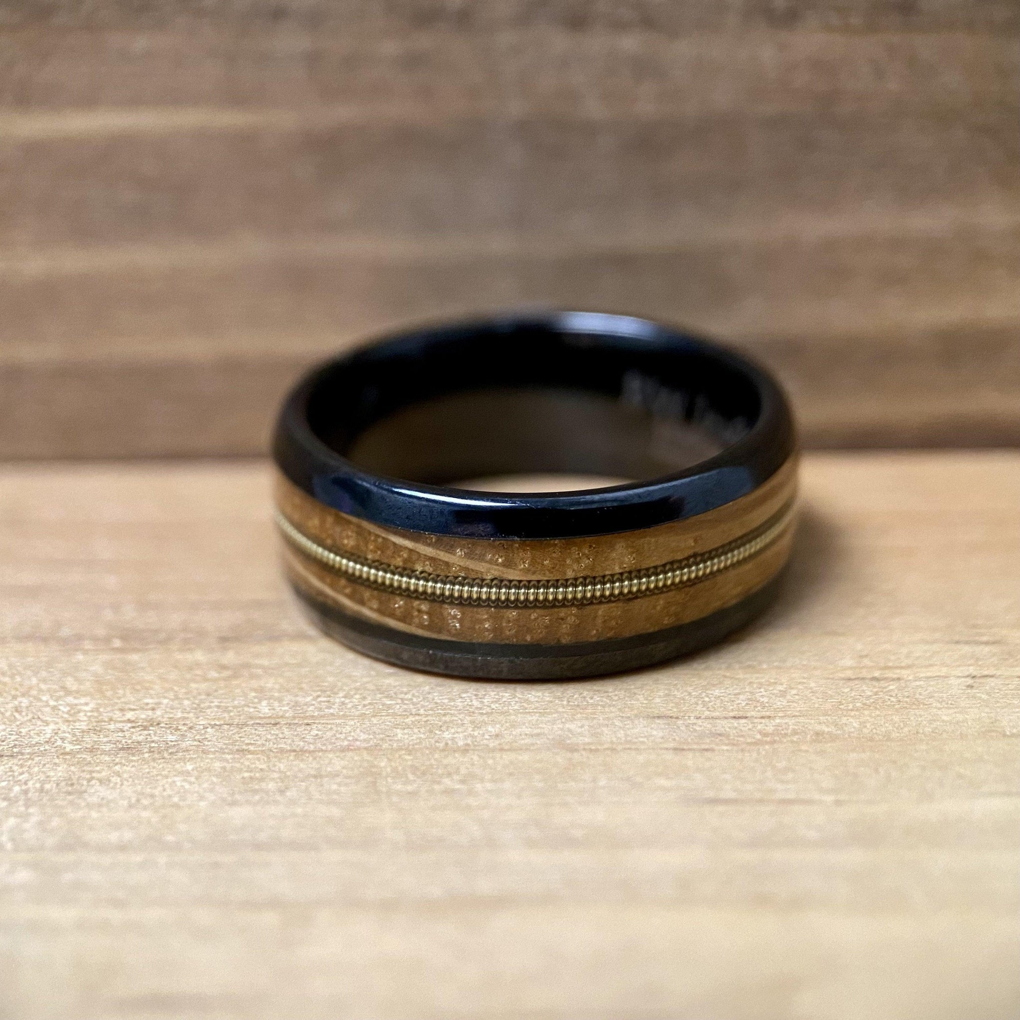 BW James Jewelers ALT Wedding Band “The Bluegrass Guitar Player”  Kentucky Bourbon Whiskey Barrel Black Ceramic Ring With Guitar String