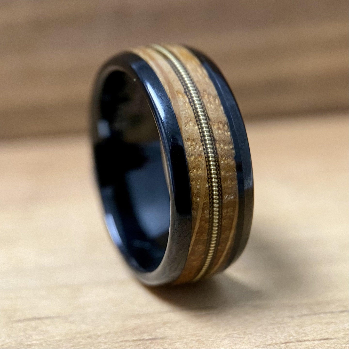 BW James Jewelers ALT Wedding Band “The Bluegrass Guitar Player”  Kentucky Bourbon Whiskey Barrel Black Ceramic Ring With Guitar String