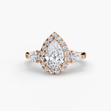 BW James Jewelers setting 9K Rose Gold / Pear Three-Stone Ring with Halo