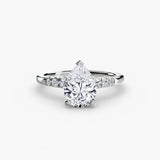 BW James Jewelers setting 9K White Gold / Pear Solitaire with Shoulder Accents