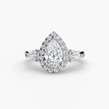 BW James Jewelers setting 9K White Gold / Pear Three-Stone Ring with Halo