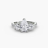 BW James Jewelers setting 9K White Gold / Pear Three-Stone with Pavé Band