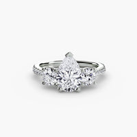 BW James Jewelers setting 9K White Gold / Pear Three-Stone with Pavé Band