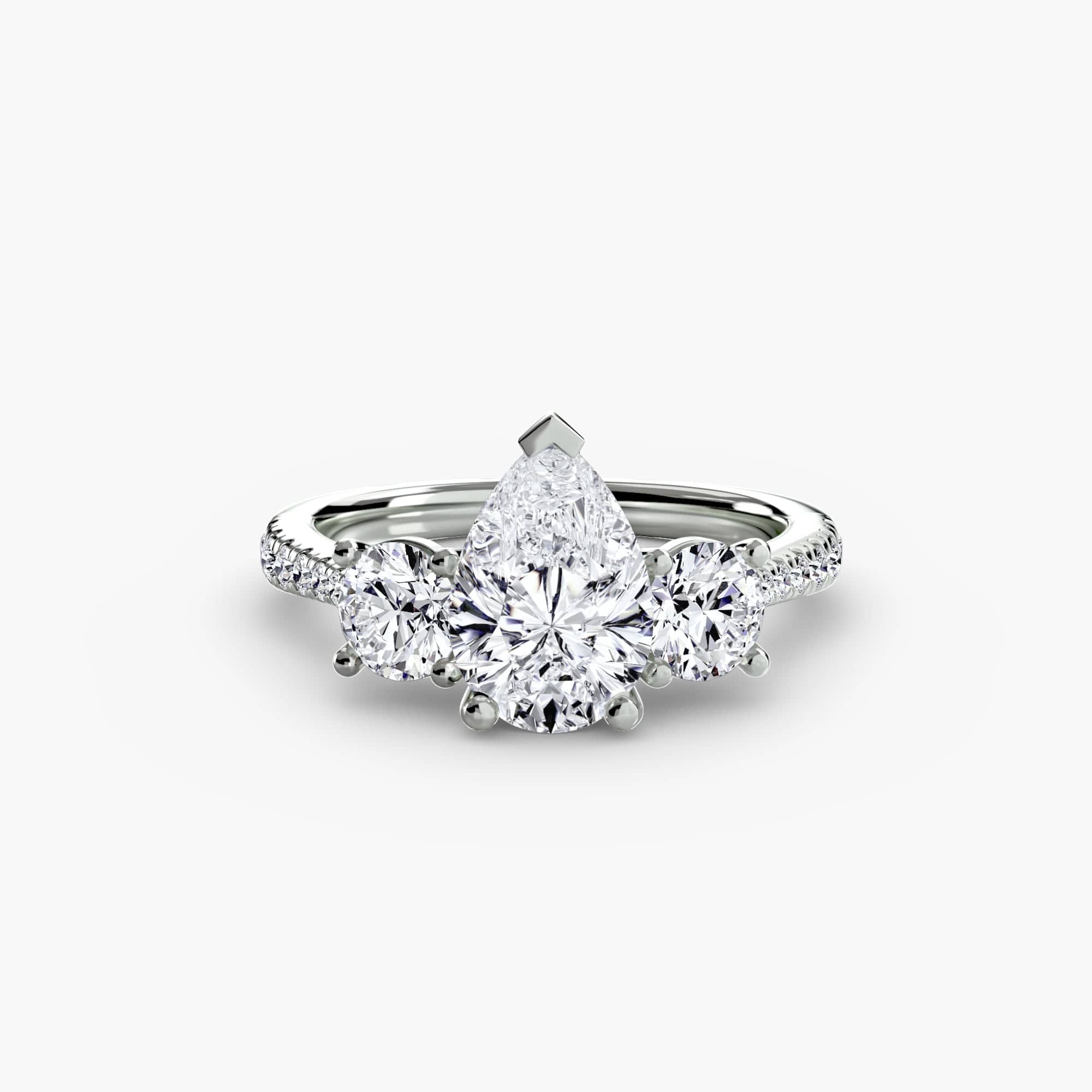 BW James Jewelers setting 9K White Gold / Pear Three-Stone with Pavé Band