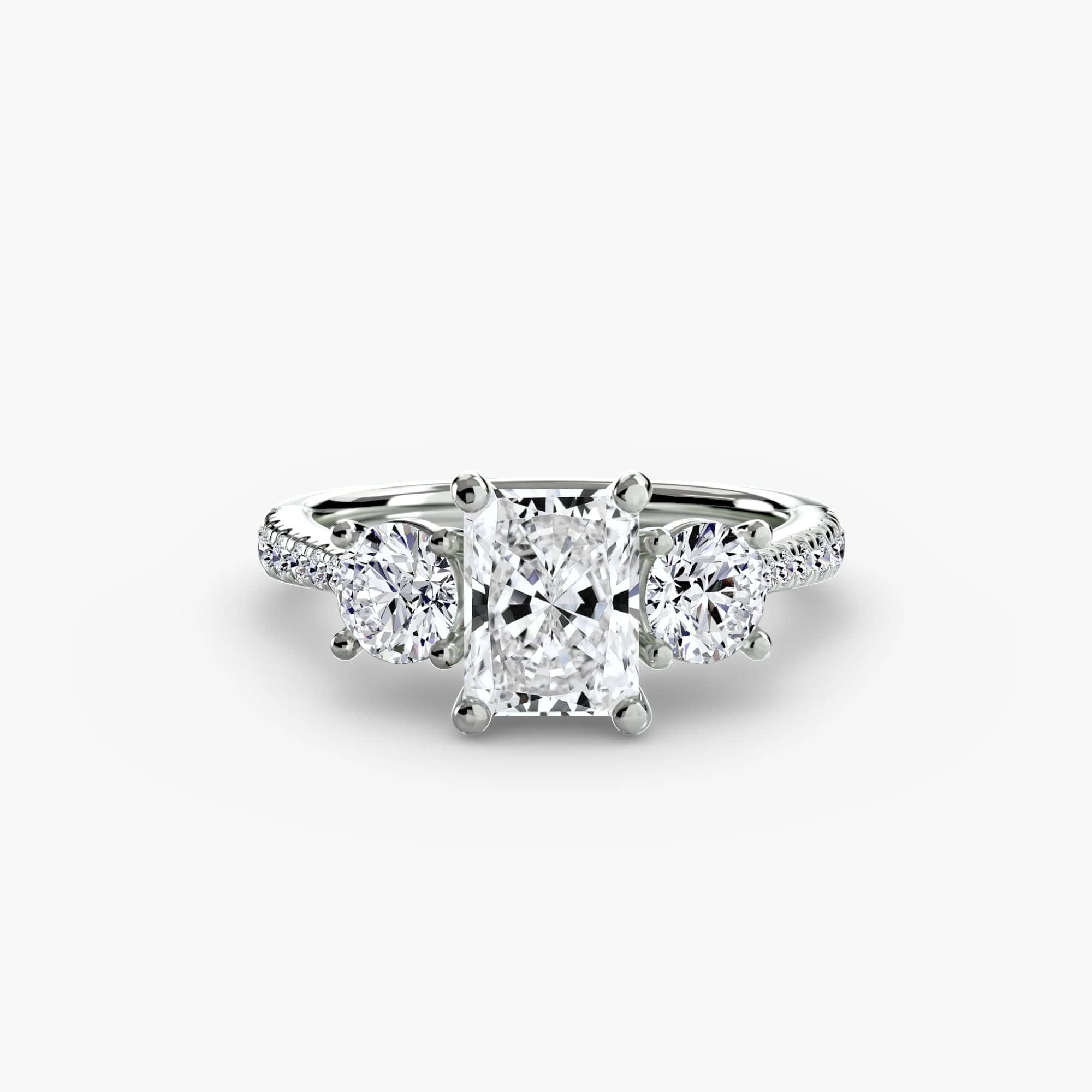 BW James Jewelers setting 9K White Gold / Radiant Three-Stone with Pavé Band