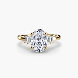 BW James Jewelers setting 9K Yellow Gold / Oval Baguette Accent Solitaire