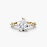 BW James Jewelers setting 9K Yellow Gold / Pear Solitaire with Eternity Pavé