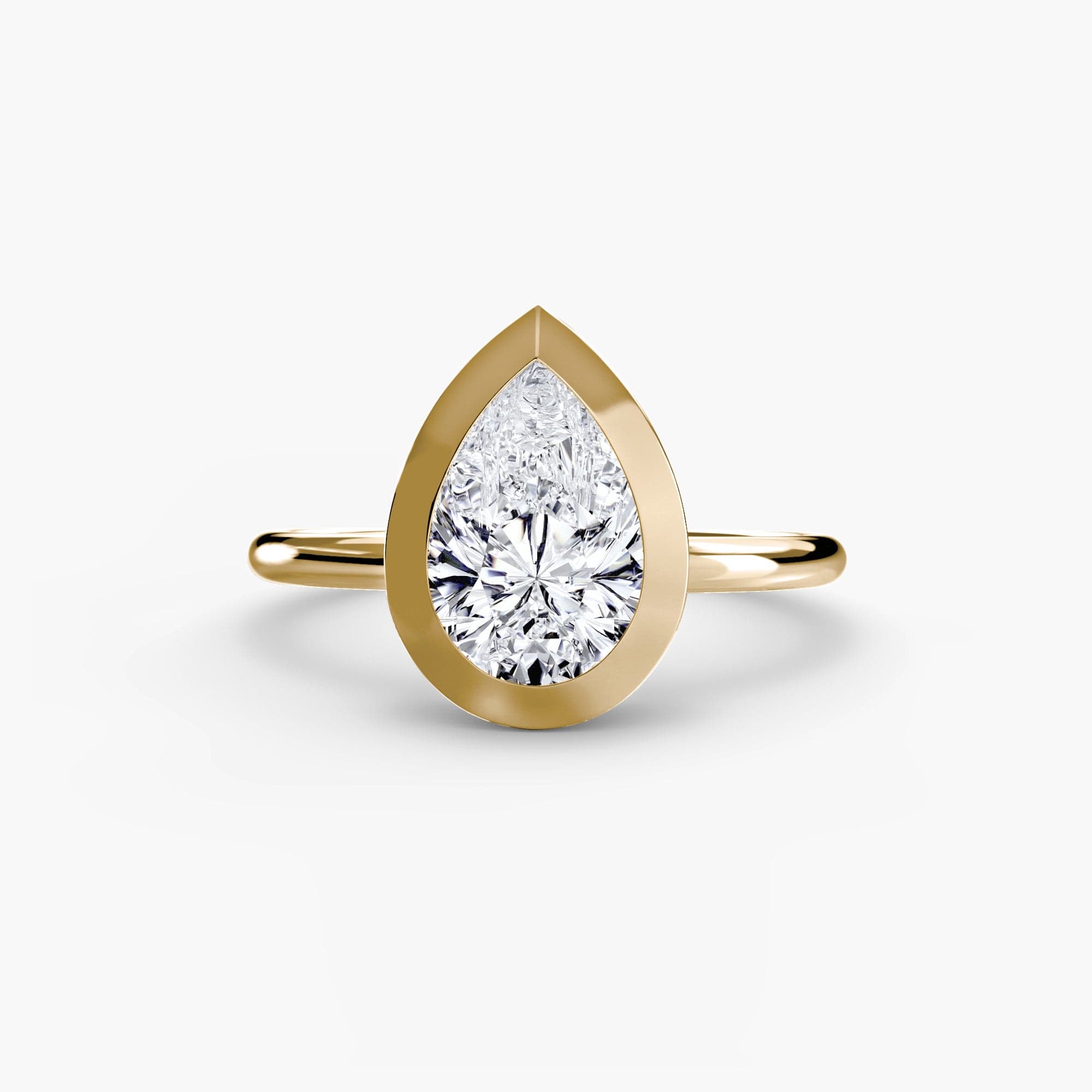 BW James Jewelers setting 9K Yellow Gold / Pear The Bezel Set Solitaire