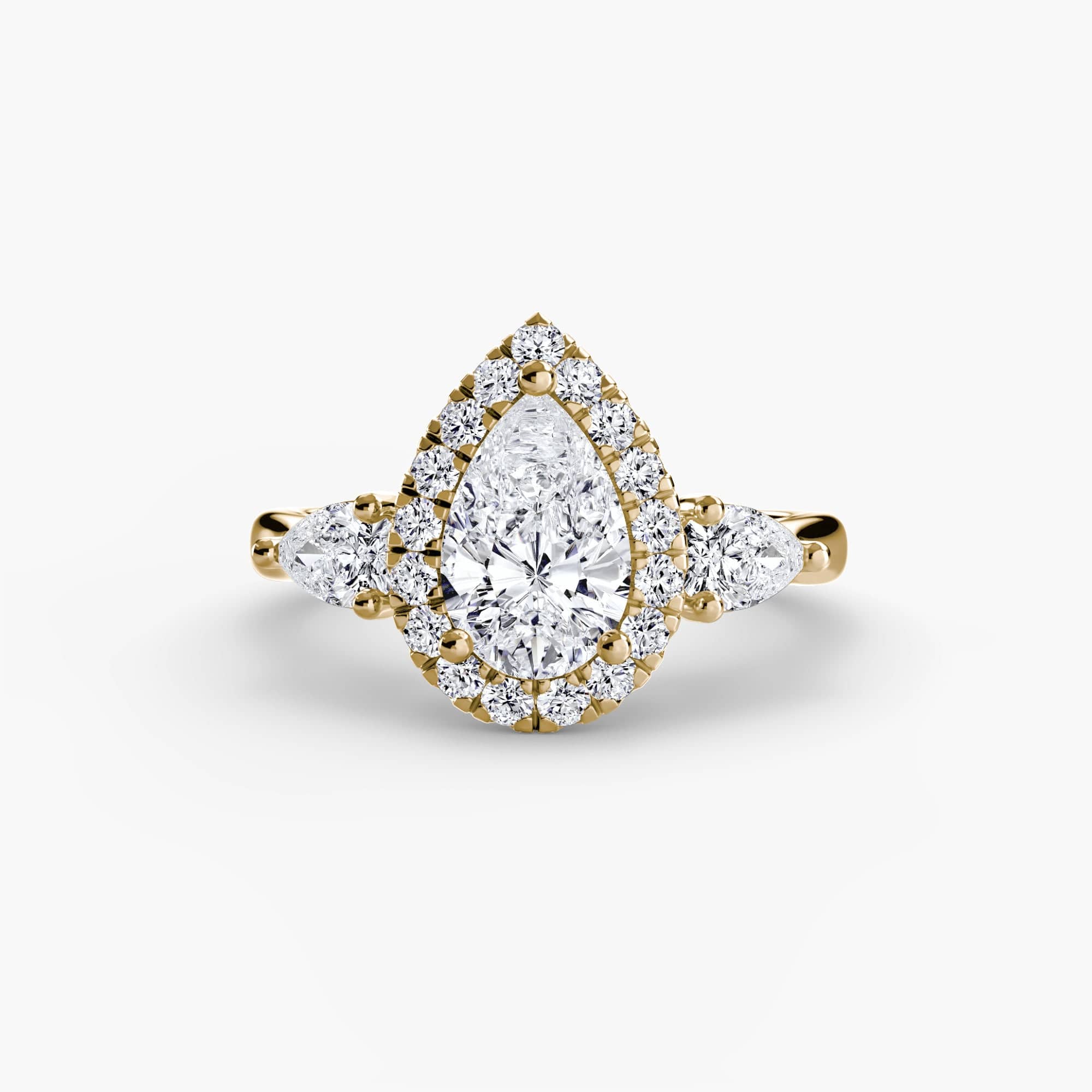 BW James Jewelers setting 9K Yellow Gold / Pear Three-Stone Ring with Halo