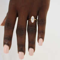 BW James Jewelers Signature Bezel Marquise Illusion with Oval Diamond