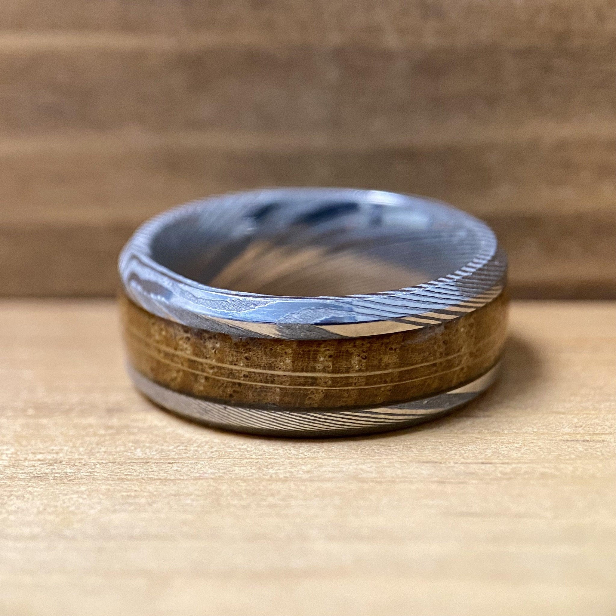 "The Rustic Warrior" Damascus Steel Design Ring With Wood From A Reclaimed Bourbon Whiskey Barrel Wedding Band BW James Jewelers 